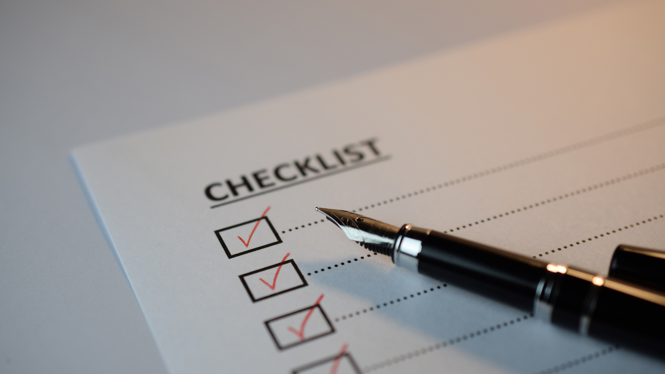 Paper with heading 'Checklist'